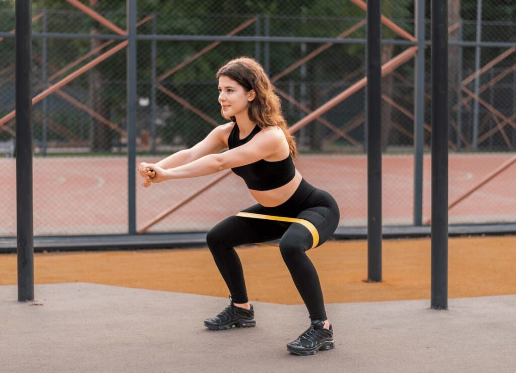 woman doing exercises on a sports field 2023 11 27 04 59 38 utc (1)