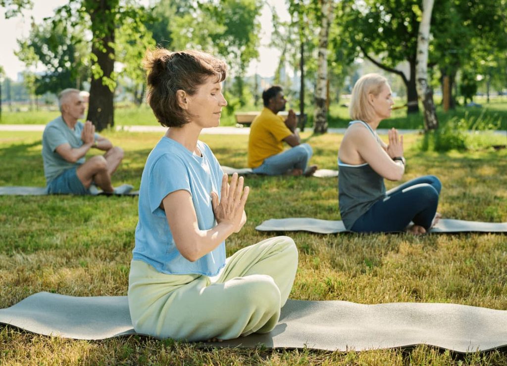 woman practicing yoga exercises in park 2024 09 18 16 31 43 utc (1)