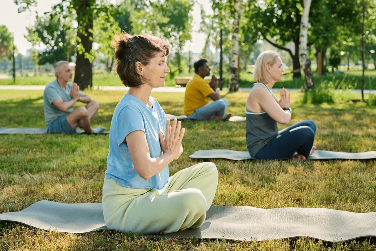 woman practicing yoga exercises in park 2024 09 18 16 31 43 utc (1)